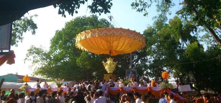 people at cremation ritual in Santitham Religious ceremony as a monk passes away