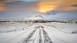 Photo art by Norbert Gräf: volcanic lake under a cloudy sky in Iceland.