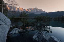 Wall art by Patrick Noack: gentle alpenglow at Lake Eibsee during sunset.