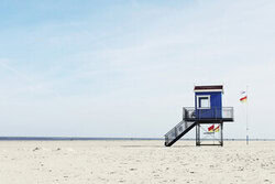 Langeoog wall art by Manuela Deigert: beach tower and expansive sandy beach
