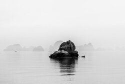 Photo art by Christian Seidenberg: black and white capture of rocks and water