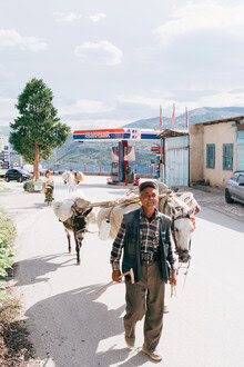 Photo art by Christian Seidenberg: Traditional life in Albania with donkey and old man.