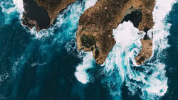 Photo art: rugged cliffs and powerful waves in Nusa Lembongan, Bali.