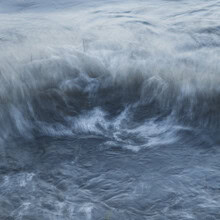 Photo art by Nadja Jacke: flowing sea waves in gentle shades of blue.