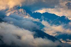 Photo art by Martin Wasilewski: Mount Haunold surrounded by clouds and fog.
