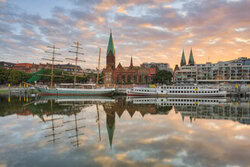View of the Schlachte in Bremen in the morning with soft light and calm water.