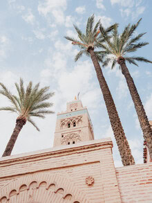 Photo art: Mosque in Marrakesh with green sky and palm trees in the foreground