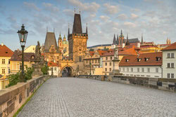 Photo art by Michael Valjak: picturesque view of Prague's Lesser Town by the Vltava River.