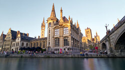 Photo art by Norbert Gräf: calm scene of Graslei in Ghent with water reflections.