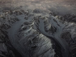 Photo art by Inflight Galerie: snow-covered mountains with a calm atmosphere in China.