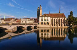 Beautiful photo art by Achim Thomae: Zurich cityscape with bridge and reflections.