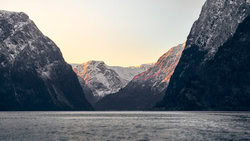 Photo art by Norbert Gräf: wintery Nærøyfjord with gentle mountains in evening light