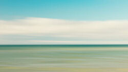 Photo art by Holger Nimtz: tranquil walk by the sea with gentle waves