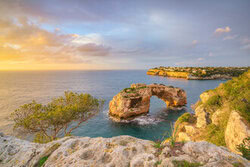 Photo art by Michael Valjak: sunrise over Es Pontàs in Mallorca, calm coastal atmosphere.