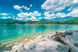 Photo art by Martin Wasilewski: calm summer day at Lake Eibsee with mountains in the background.