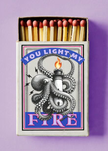 Wall art featuring a funny scene: a lighthouse and matches igniting a fire.