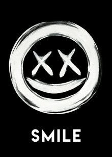 Wall art featuring an inverted smiling face, creating a cheerful atmosphere.