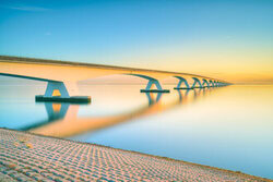 Photo art by Michael Valjak: Zeeland Bridge in warm morning light