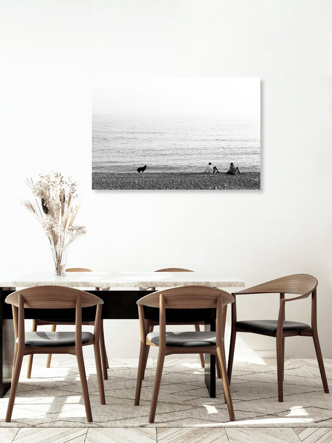 Schwarzer Hund am blauen Meer, France – wall art by Aria Wojciechowski as Poster or Acrylic Glass Print