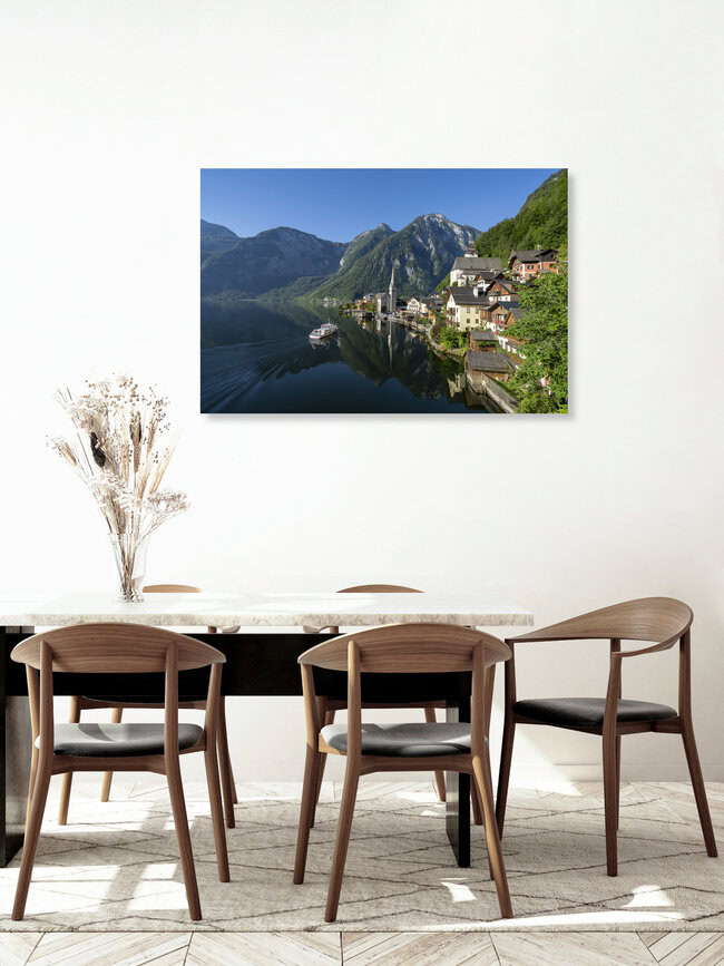 Hallstatt with clear blue sky and boat, Austria – wall art by Franz Sussbauer as Poster or Acrylic Glass Print