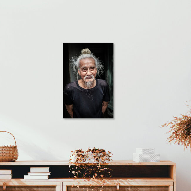Old man in the streets of Ha Noi, Vietnam – wall art by Jörg Faißt as Poster or Acrylic Glass Print