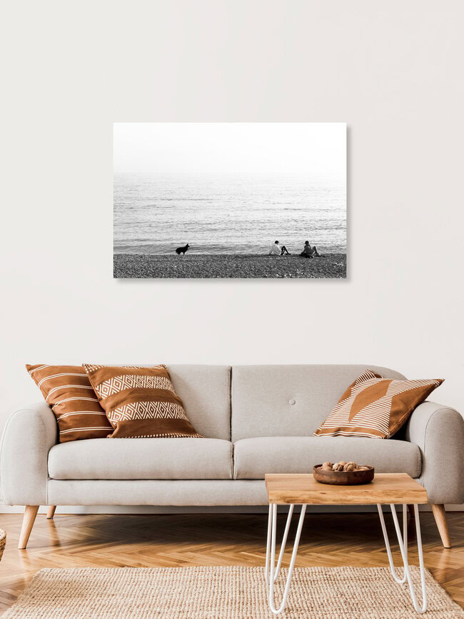 Schwarzer Hund am blauen Meer, France – wall art by Aria Wojciechowski as Poster or Acrylic Glass Print