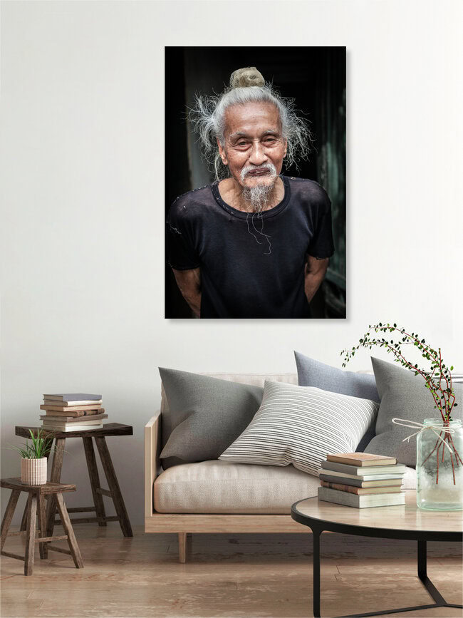Old man in the streets of Ha Noi, Vietnam – wall art by Jörg Faißt as Poster or Acrylic Glass Print