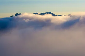 Kaiser Mountains in a Sea of Fog - Fineart photography by Martin Wasilewski