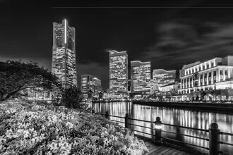 Photo art by Melanie Viola: Yokohama's night skyline with lights and water reflections