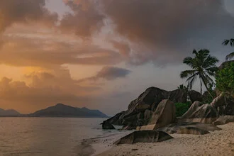 Photo art by Anke Dörschlen: evening mood on La Digue with calm sea and palm trees