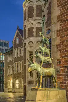 Photo art by Michael Valjak: Bremen Town Musicians in the night-time old town