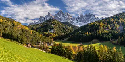 Photo art by Achim Thomae: autumn panorama with larches and Geisler peaks in South Tyrol