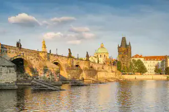 Photo art by Michael Valjak: Charles Bridge in Prague bathed in gentle evening light