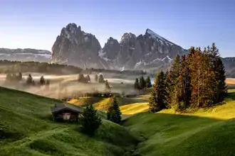 Photo art by Achim Thomae: Sunrise over the Dolomites with gentle morning mist