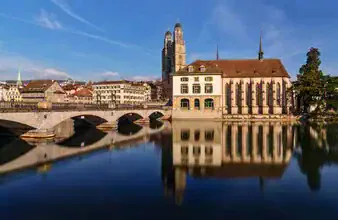 Beautiful photo art by Achim Thomae: Zurich cityscape with bridge and reflections.