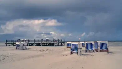 Photo art by Achim Thomae: Beach life in St. Peter-Ording with clouds and beach chairs