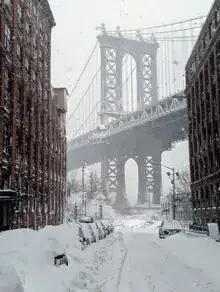 Photo art by Matthias Reichardt: snowy Manhattan Bridge in Brooklyn