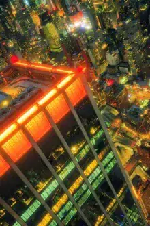 Aerial view of Manhattan: glowing skyscrapers at dusk