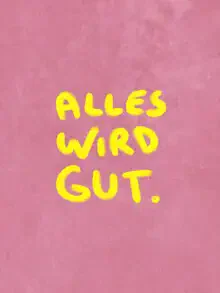 Wall art featuring hand lettering: simple yellow text conveying a positive message