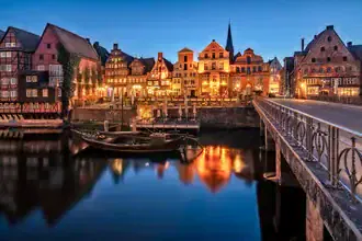 Photo art by Achim Thomae: historic Old Harbour in Lüneburg at night