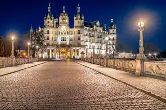 Photo art by Achim Thomae: Schwerin Castle at night, gentle lighting and calm atmosphere