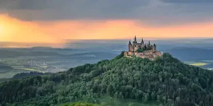 Photo art by Achim Thomae: Hohenzollern Castle bathed in warm light during golden hour