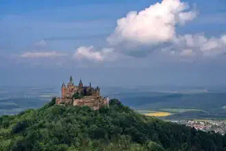 Photo art: Hohenzollern Castle in the Swabian Jura with springtime clouds