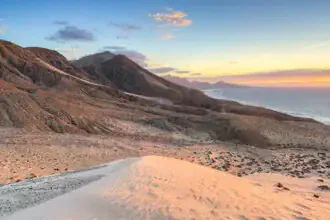 Fotokunst von Michael Valjak: Sonnenuntergang über den Dünen von Jandía, Fuerteventura