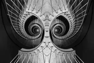 Photo art: Staircase resembling a face, captured in soft shades of gray.
