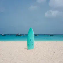 Photo art by J. Daniel Hunger: surfer riding a wave at Sal beach, Cape Verde