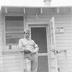 John Aldred outside the D Company Day Room. Aldred Day Room