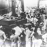 Tank of the 194th Tank Battalion being unloaded at Manila. Note that the turret was removed so the tank would fit in the ship's hold. Gibson1
