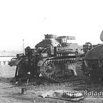 A Company tanks being worked on by members of the company. Sandmire15