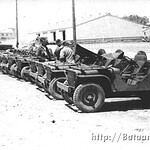Members of A Company do maintenance work on their jeeps. Sandmire46